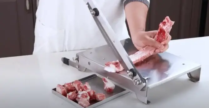 Slicing Meat With Manual Meat Slicer Use manual meat slicer