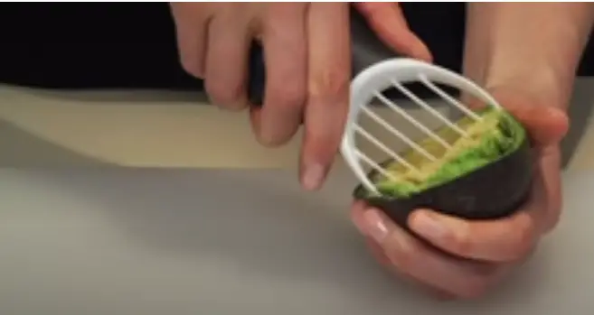 Step 4 to slicing Avocado