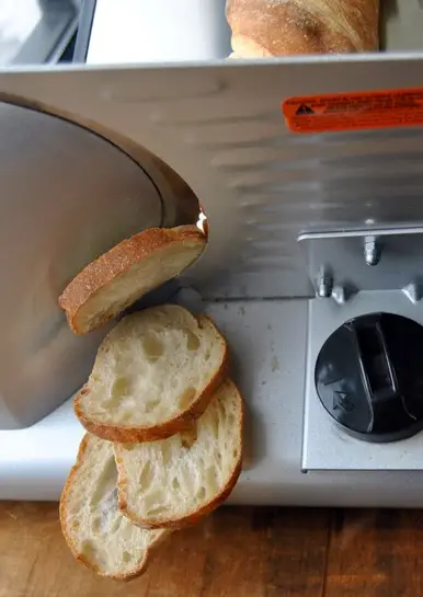 Bread in meat slicer