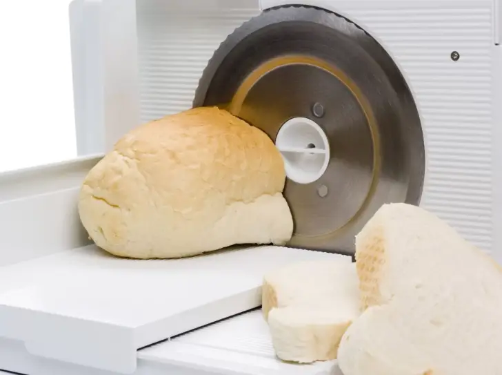Using a meat slicer to cut bread