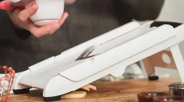 A Mandoline Slicer A mandoline slicer