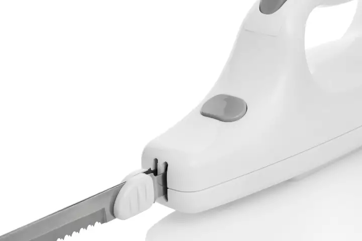 Electric Knife Slicing Meat With an Electric Knife