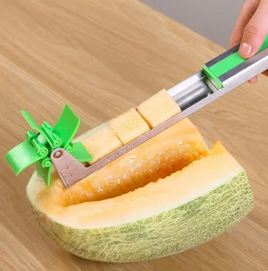 Slicing cantaloupe in cubes with a melon slicer