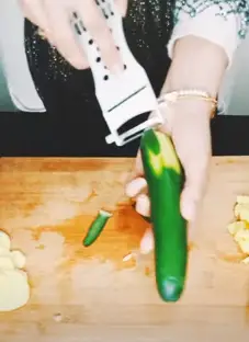 Step 2 to slicing cucumber