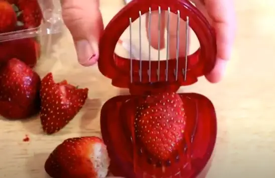 Step 2 to slicing strawberry