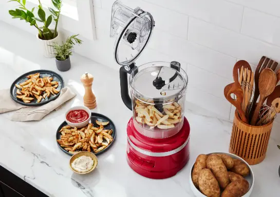 Slice potatoes in Food Processor put potatoes in food processor