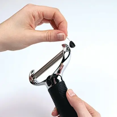 Turning The Screws For Tighten Cheese Slicer Wire Tighten cheese slicer wire