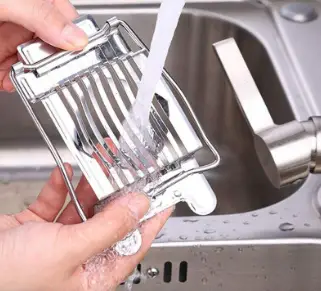 Clean egg slicer in the right way