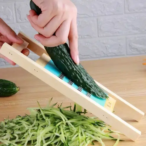 Wooden cucumber slicers
