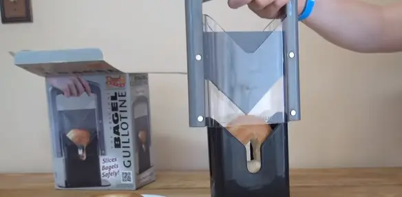 Step 2 to slicing bagel