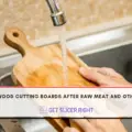 How to clean wood cutting boards after raw meat and other techniques?