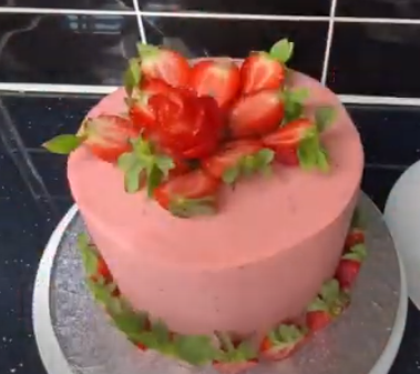 Add the strawberry roses to your cake