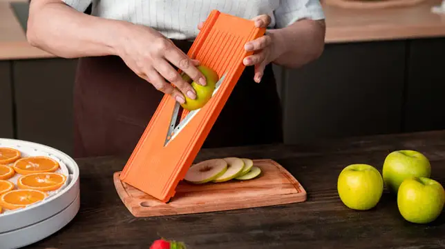 Can I use a mandoline to slice soft or delicate fruits and vegetables