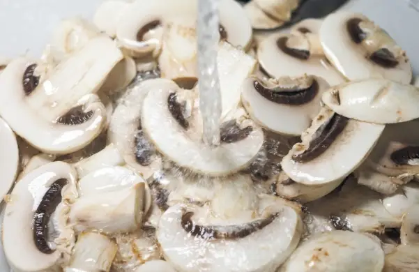 Do i need to wash sliced mushrooms before cooking