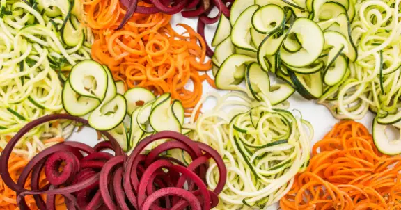 How To Use A Spiralizer For The Perfect Veggie Noodle Dishes How to use a spiral slicer