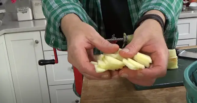 Removing The Apple Removing the apple and handling sliced apples