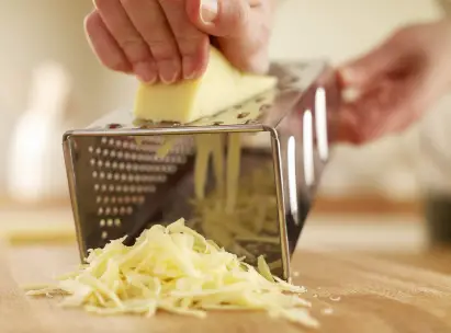 The Best Tricks For Shredding Cheese Shredding with grater