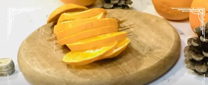 Slice oranges into thin rounds Slice oranges into thin rounds