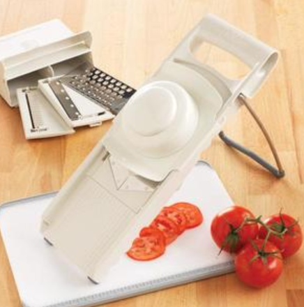 Slicing tomatoes with the pampered chef slicer
