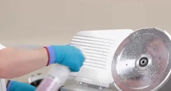 Spray the blade with a cleaner