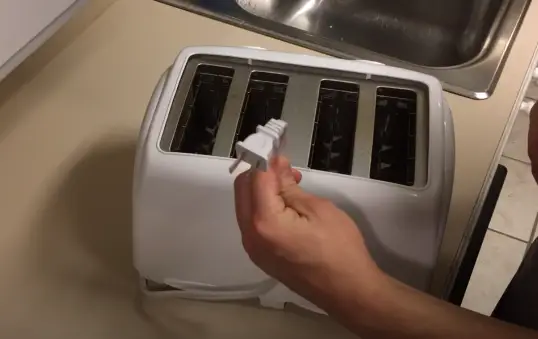 Unplug the toaster