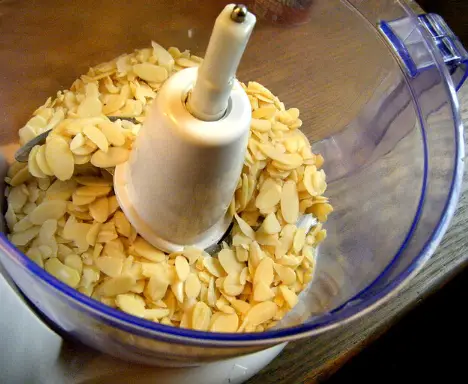 Can I use a food processor to slice, sliver, or dice almonds