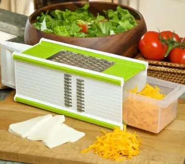 Grating cheese using a vegetable chopper