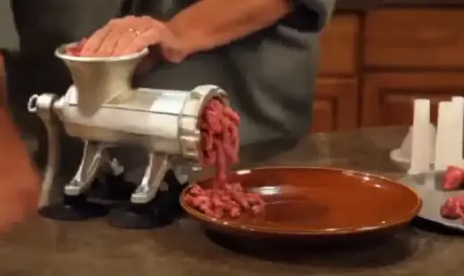 Grind the meat until it comes out