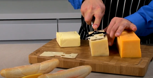 Hand-held cheese slicer overview