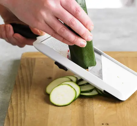 How to use a mandoline slicer, safely How To Safely Use A Mandolin Slicer