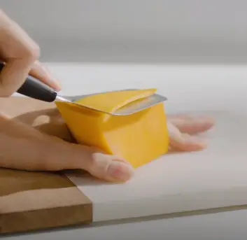 The Plane Cheese Slicer Cuts Through The Cheese With A Flat, Wide Blade How it works