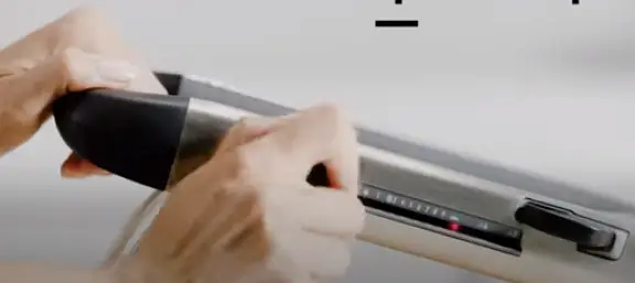 Use the knob on the mandolin slicer to adjust the thickness Adjust the Thickness