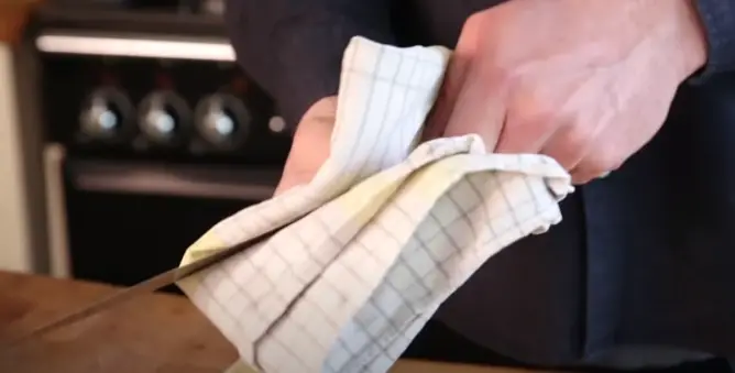 After sharpening, clean the knife again to remove any metal filings Clean the Knife
