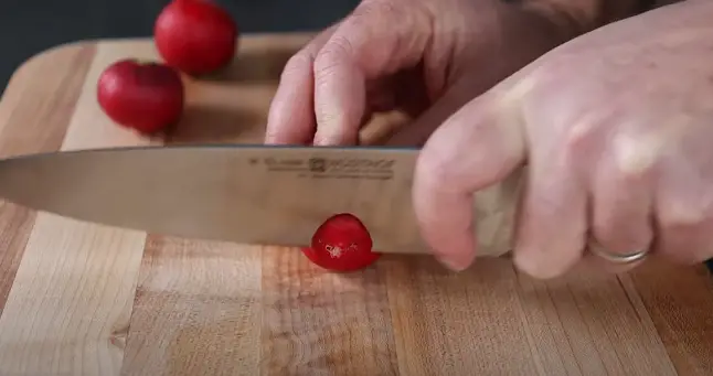 Trim off the root and stem ends of the radish Cut off Each End