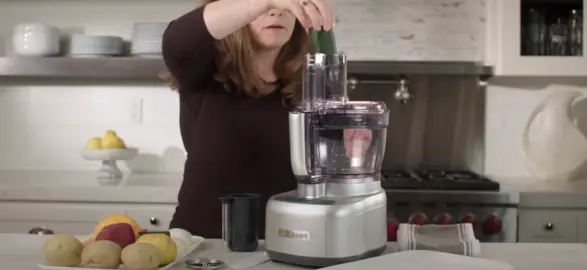 Feed the Zucchini into the Food Processor