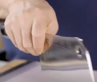 Hold the cleaver properly