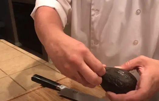 Holding the Avocado