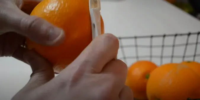 How to peel an orange with peeler