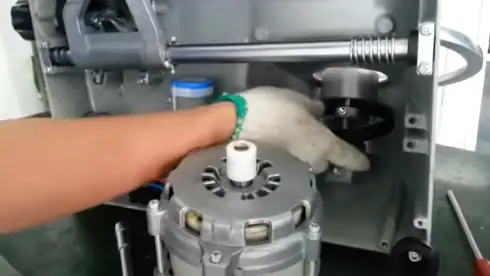 Locate the belt mechanism Locate the belt tension adjustment mechanism
