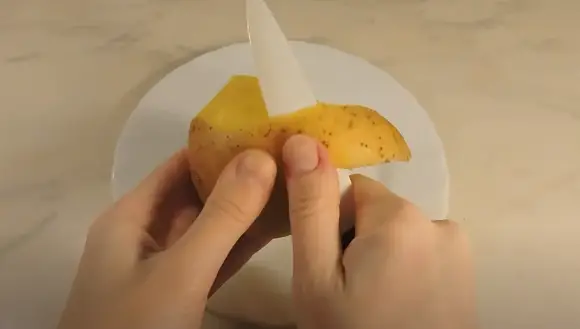 Move Your Knife In A Circular Motion Until You Have Removed All The Skin From The Potato. Move your knife in a circular motion