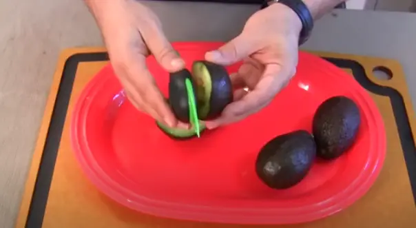 Lift the pitter, and the seed should come out cleanly Pitting the Avocado
