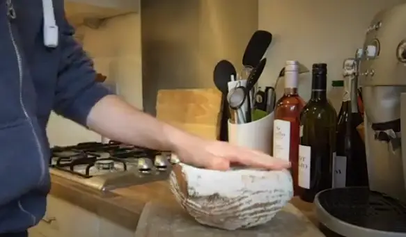Position the bread for slicing Position the bread