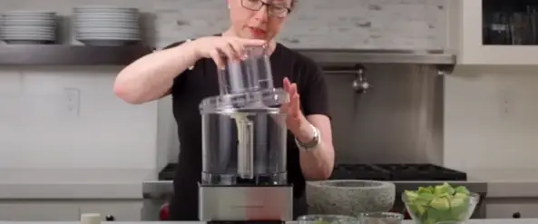 Place the cover onto the bowl, making sure it clicks securely into place Secure the cover
