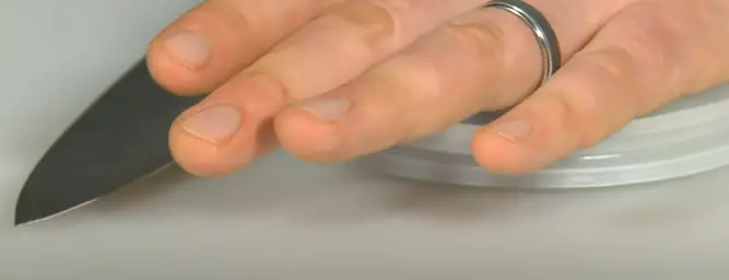 Slicing With Sharp Knife Slice between the two lids