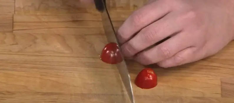 Slicing Cherry Tomatoes Into Quarters