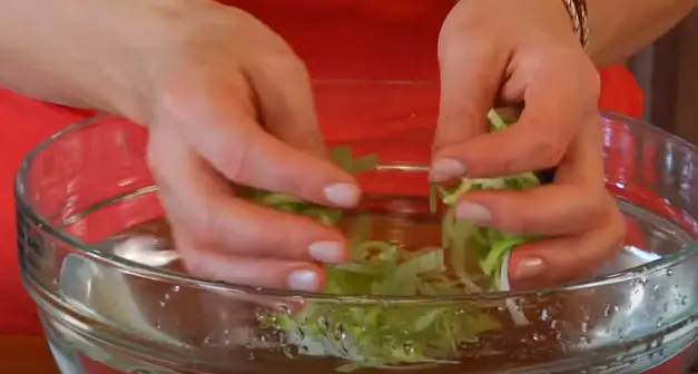 To clean the leeks, place them in a large bowl