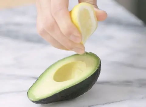 To store an avocado using the lemon juice method