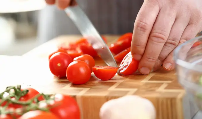 What type of knife should I use to slice cherry tomatoes