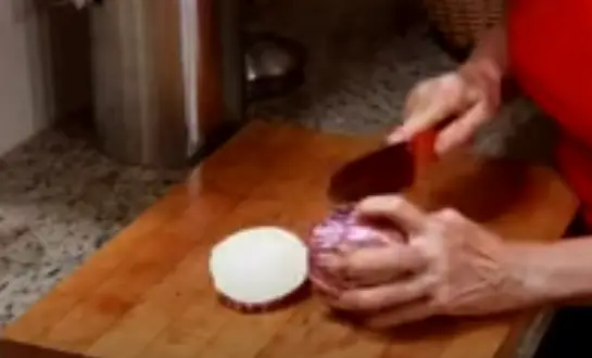 Cut the eggplant with knife Cut the eggplant