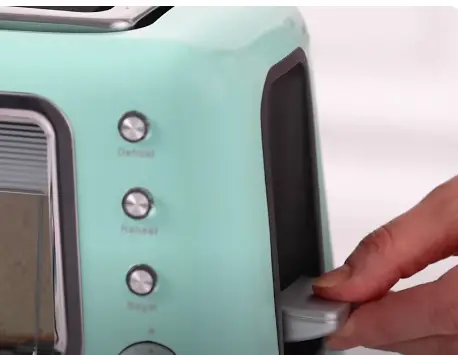 Press the carriage lever down until it lock Press the carriage lever down until it locks into place